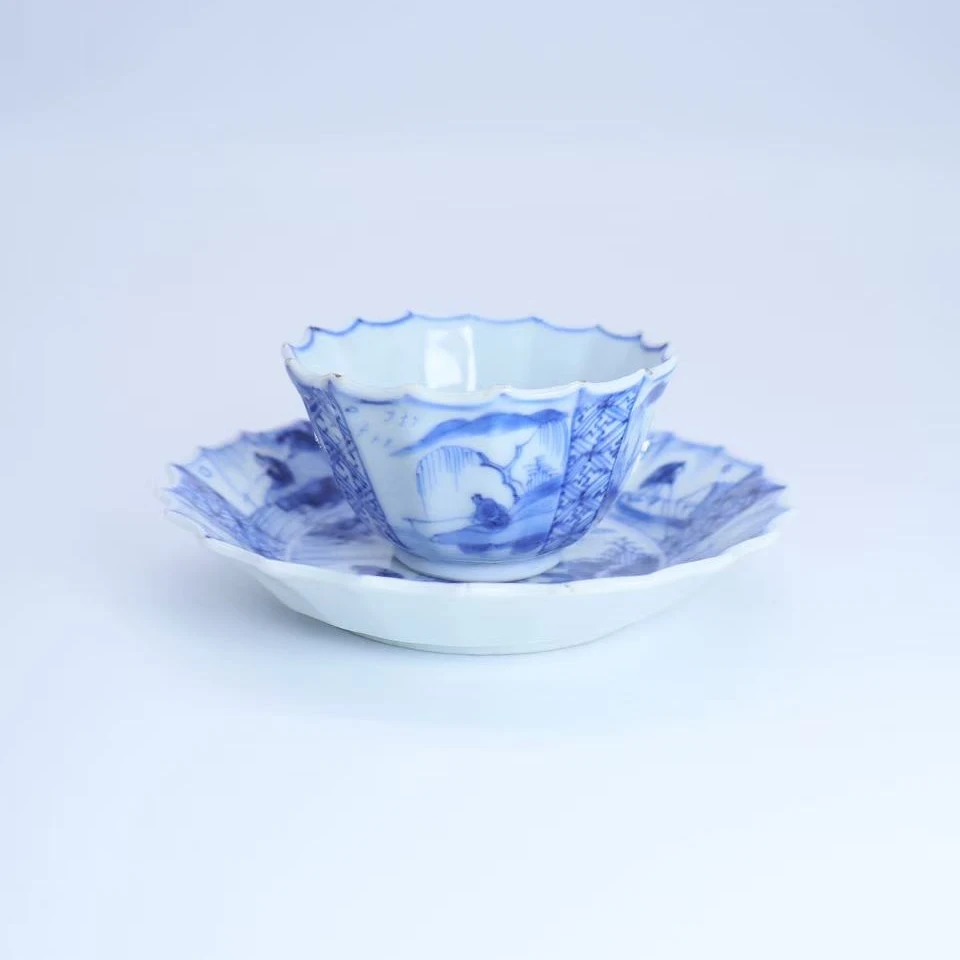 41: 清康熙青花山水人物花口套杯一组