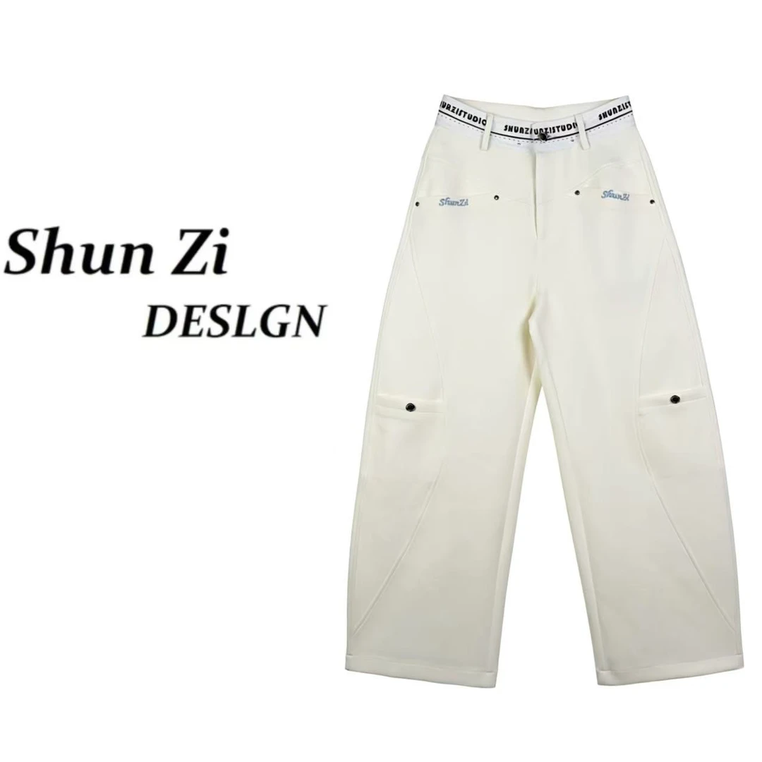 顺子/SZ28686 【流金岁月】原创设计师新款极简风刺绣显瘦小弯刀裤