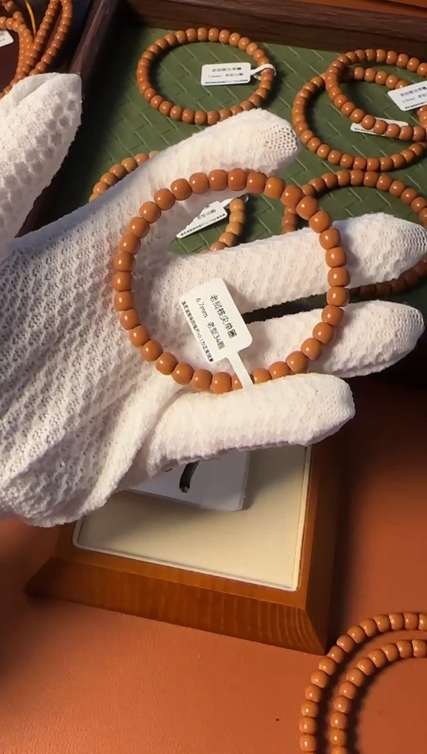 手串橄榄核【168核尖】6.7mm老挝核尖老型单圈 三花面无白树王老料