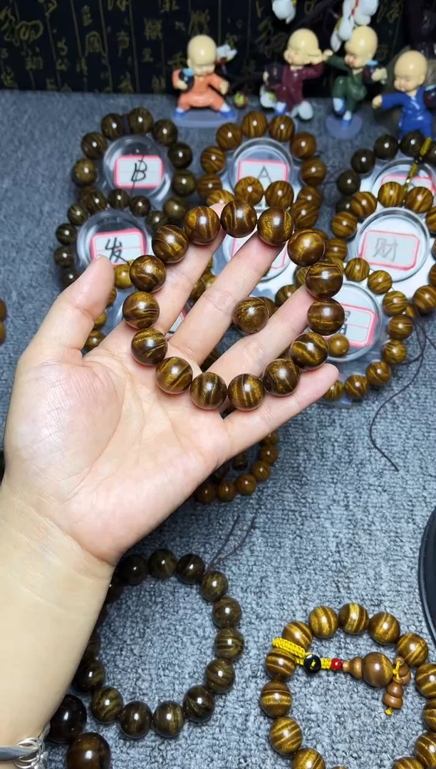 金丝楠手串/手链1.5黑金闪电龙胆纹750