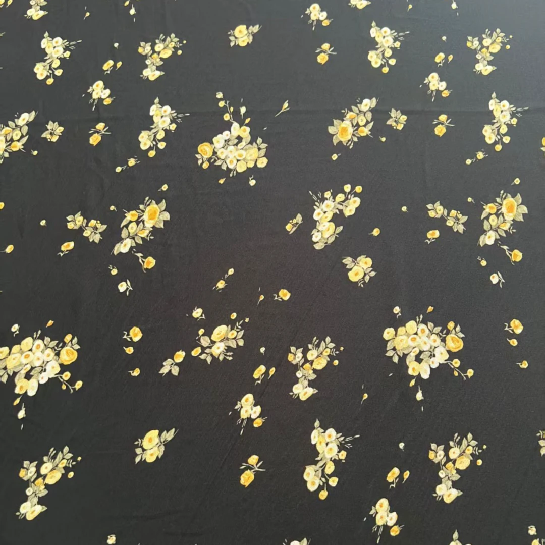 夏季新款乔其纱黑底黄色小碎花连衣裙布料