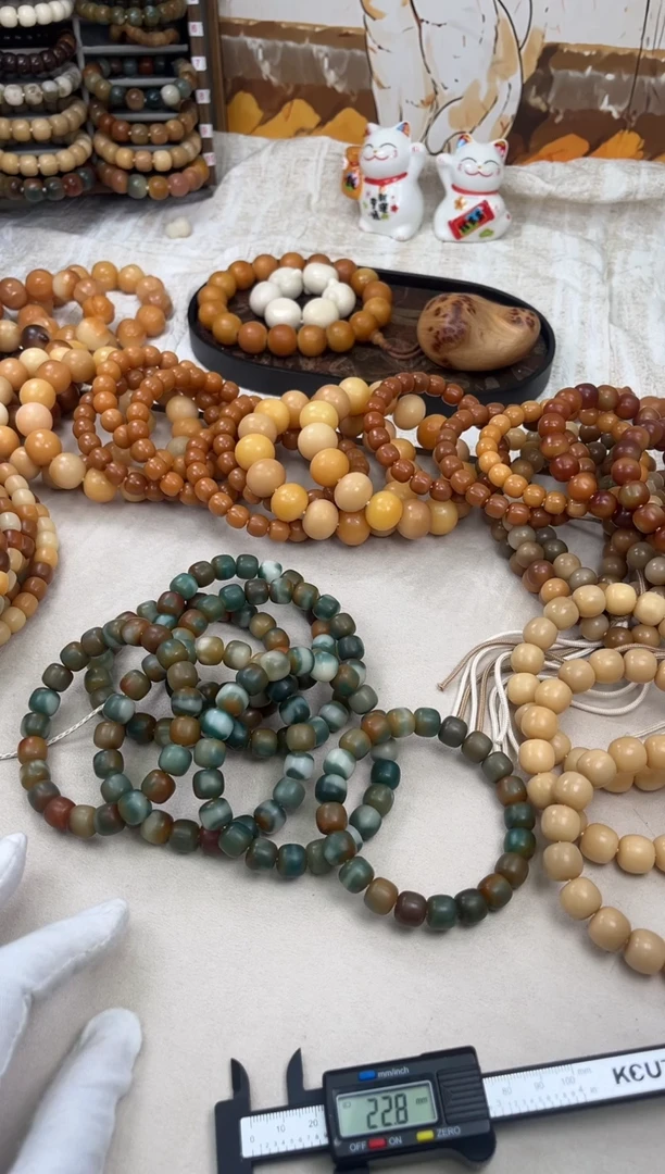 菩提根/象牙果手串a735卡11.5 干磨大瑕