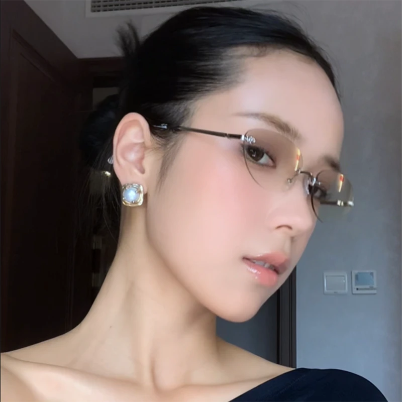 欧美辣妹无框墨镜女高级感2025新款复古老钱街拍防紫外线太阳眼镜