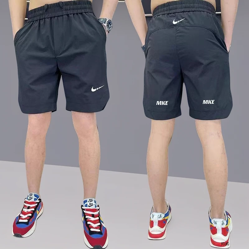 夏季流行薄款冰丝速干裤男网红五分直筒休闲沙滩宽松短裤子