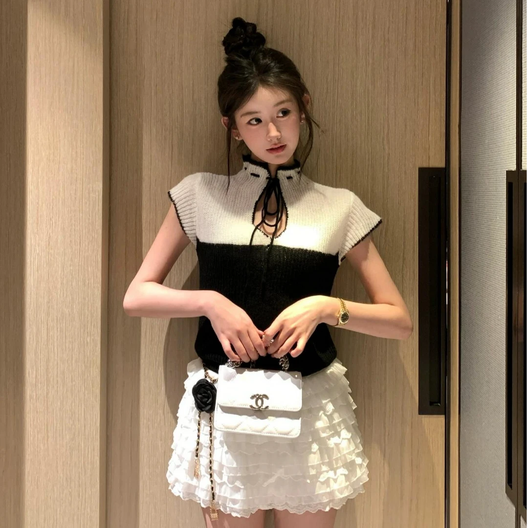 黑白拼色针织衫女2025秋冬韩版时尚修身显瘦设计感上衣蛋糕半身裙