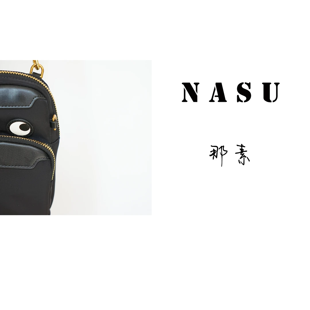 黑色大眼睛斜挎单肩手机包 18*10