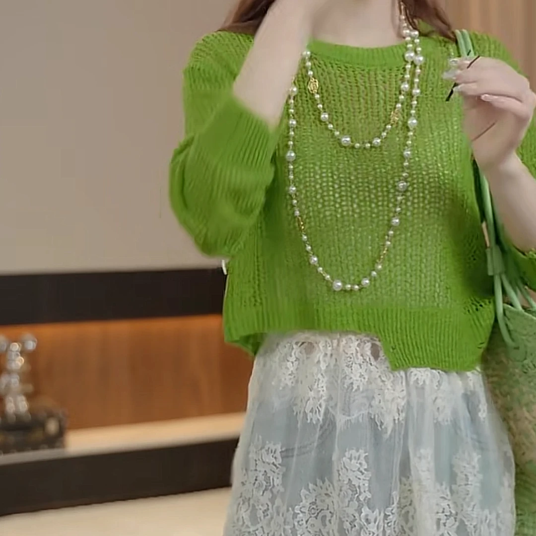 一粒扣镂空针织衫上衣2025新款春季别致设计感减龄洋气欧若风罩衫