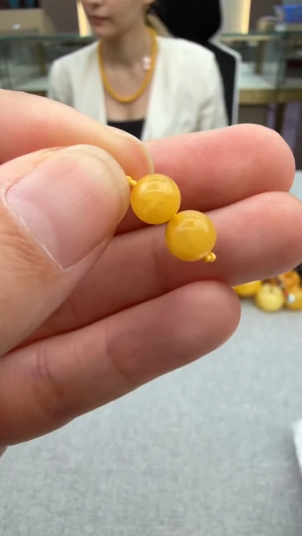琥珀颈饰未镶嵌5秒拍号 假一罚三