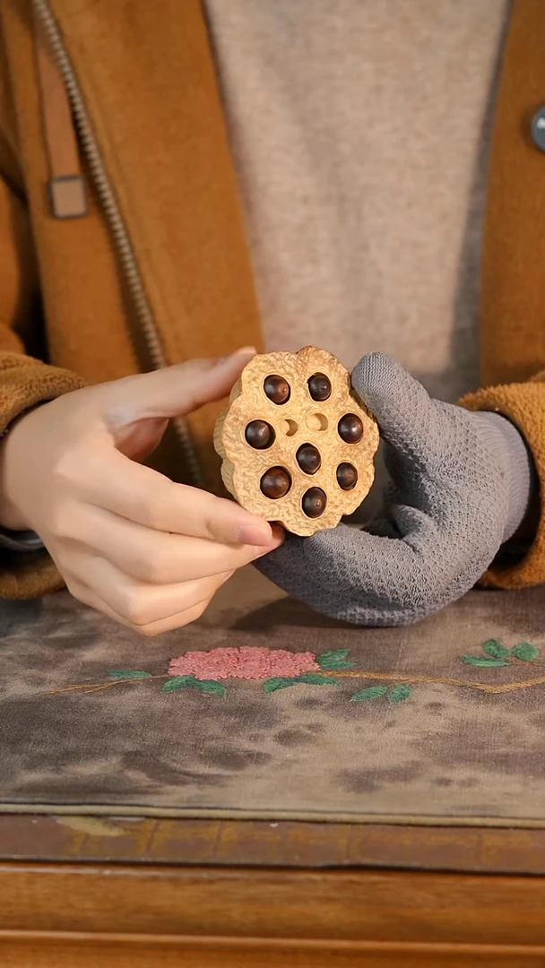 乌木类金丝楠黄料莲蓬手把件