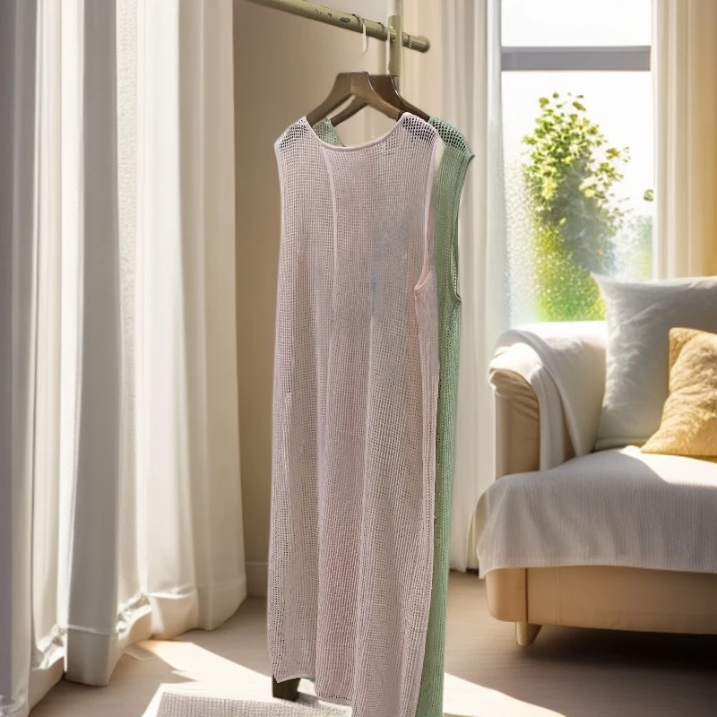 9826 祺欣家 法式镂空后背开叉宽松中长款高级感针织背心连衣裙