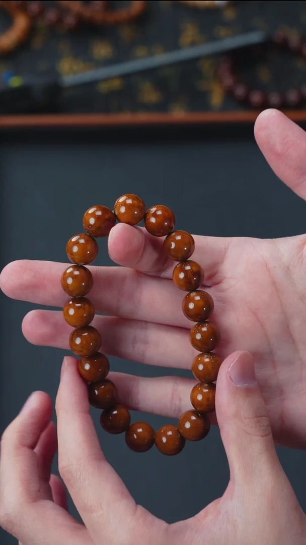 手串紫金鼠油核光珠12+