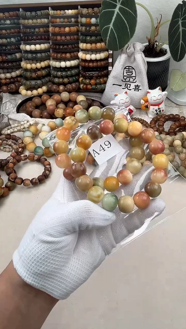 菩提根/象牙果手串a49卡16 干磨瑕疵