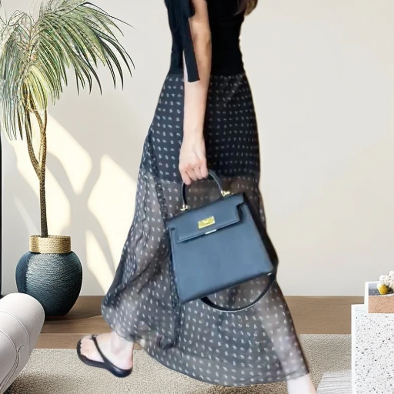 高级感黑色拼接网纱波点半身裙女2025年夏季新款法式度假风中长裙