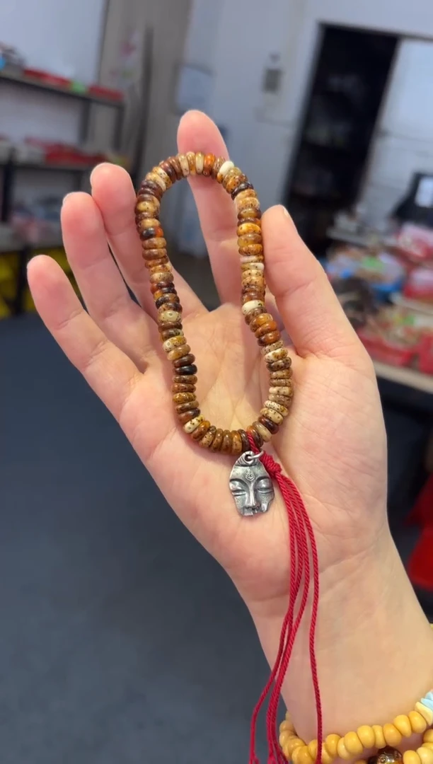 吊坠菩提根/象牙果8mm星月火烧云【大慈大悲】手持