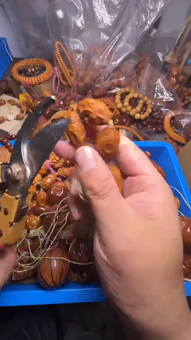 手串橄榄核把把胡一串破的