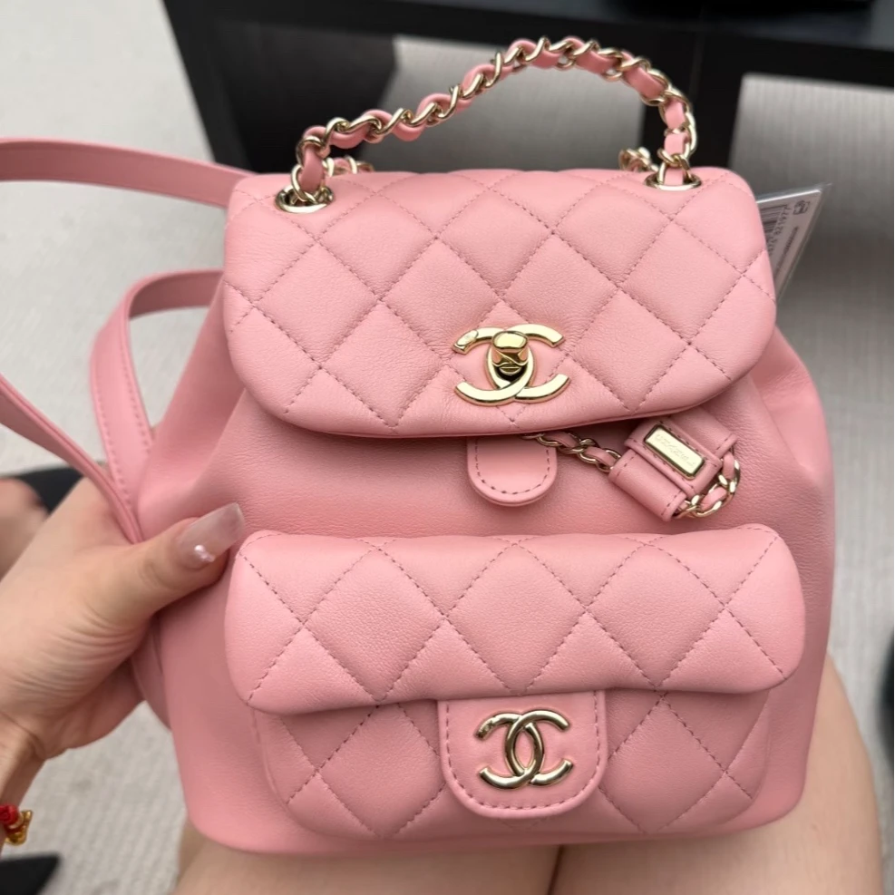 99新 Chanel/香奈儿 小花6珊 Duma 粉色抽绳口盖双肩包 芯片开