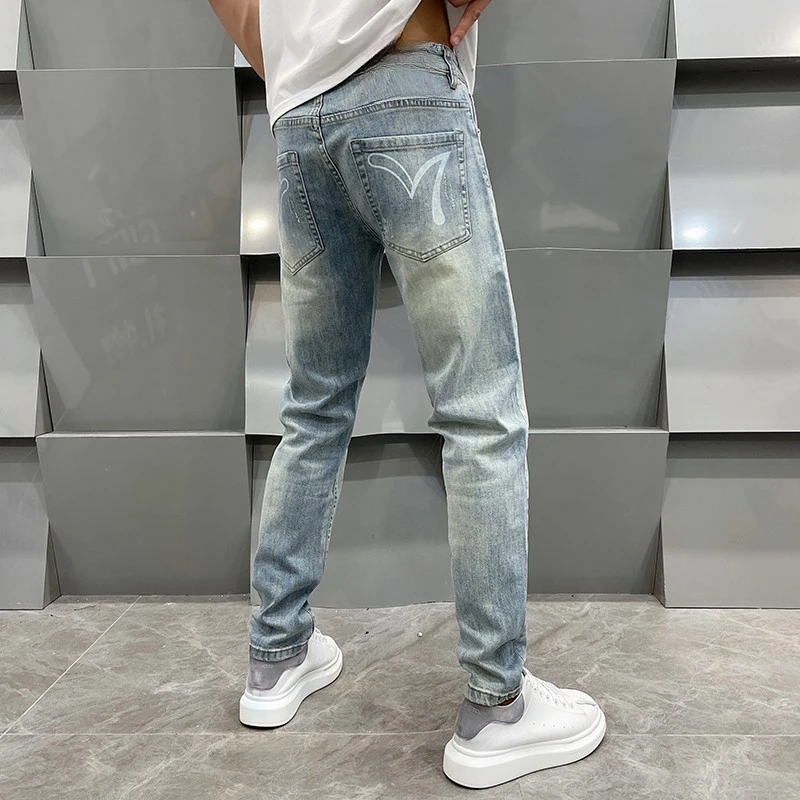 高端黄泥染牛仔裤男春夏新款欧版潮流百搭休闲直筒时尚修身小脚裤