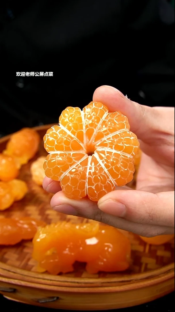 印尼石小桔子手把件