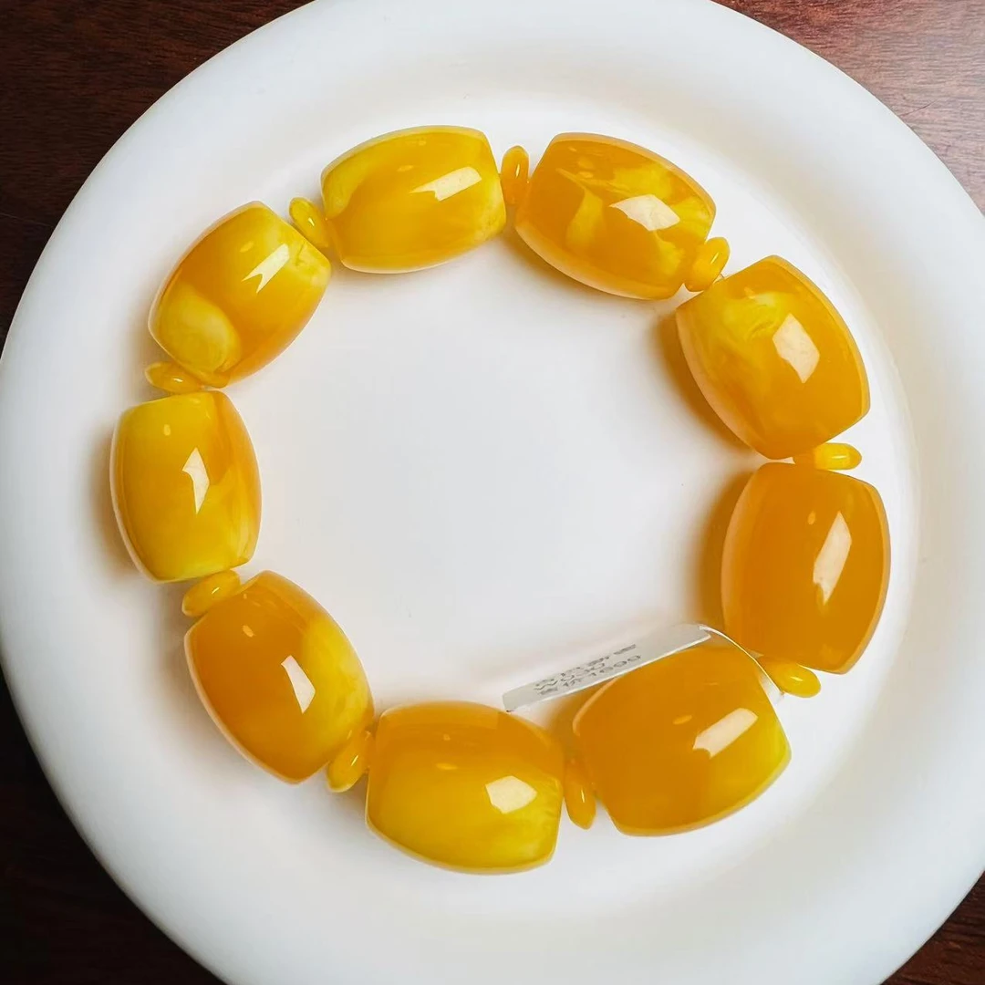 W030古巴新蜜鸡油红飘花桶珠手串19mm