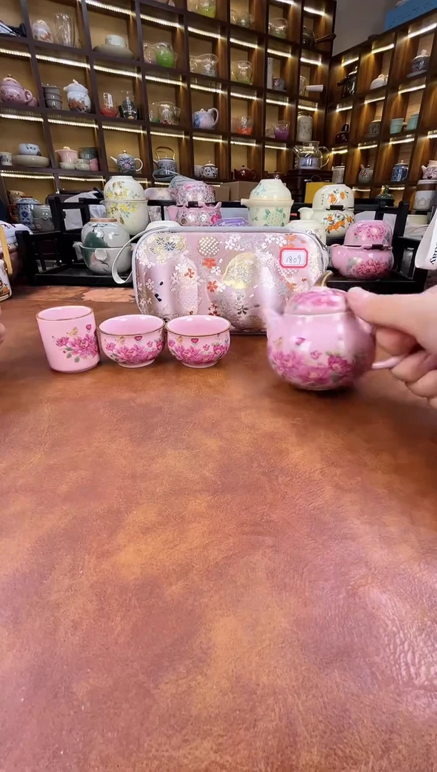瓷片粉色梨形手把壶旅行