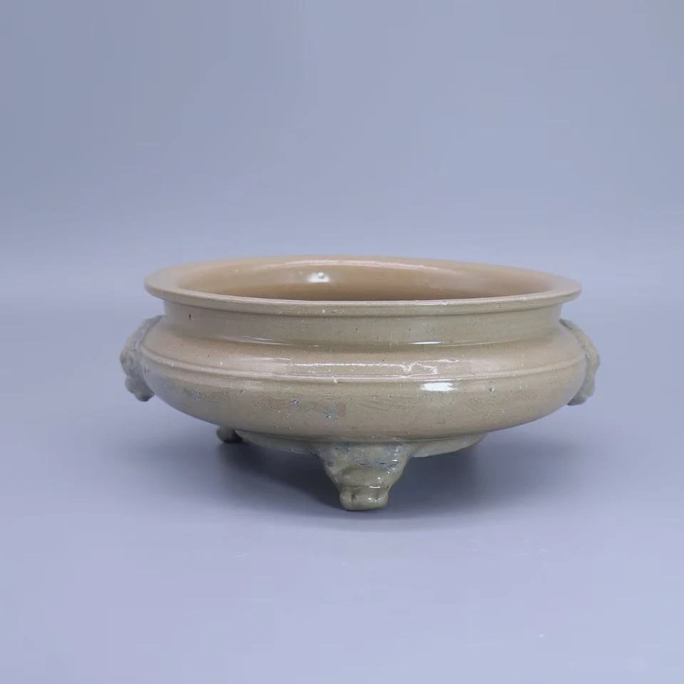 22: 明青釉三足兽耳炉