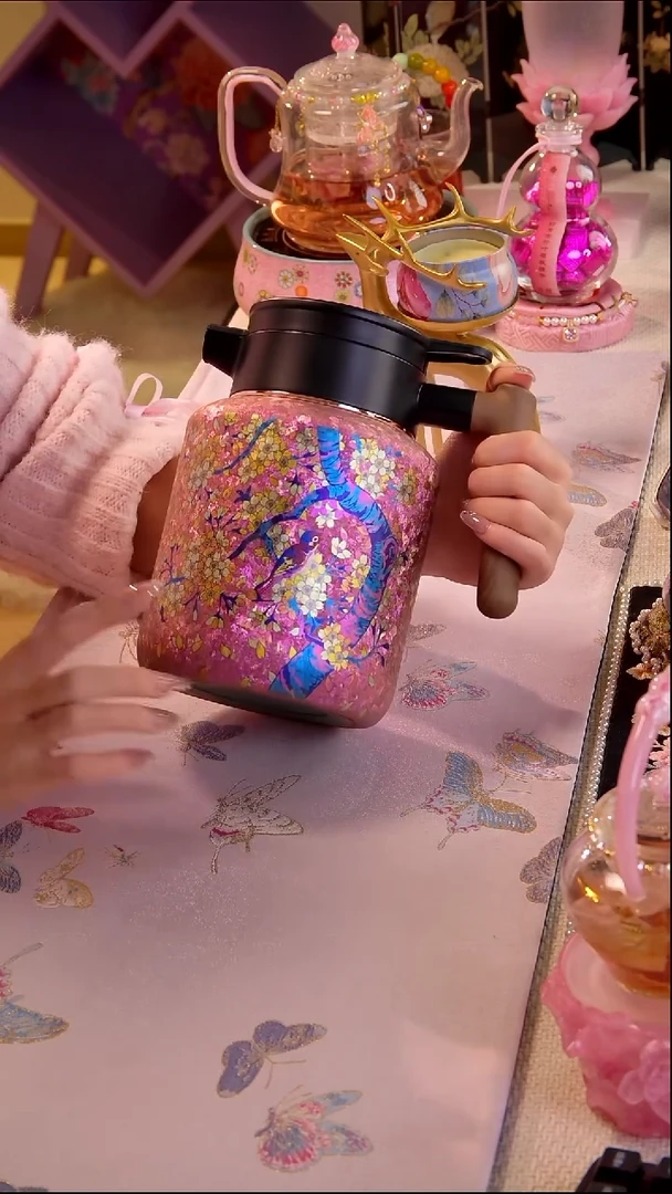 喜上眉梢 纯钛焖茶壶 如图所示