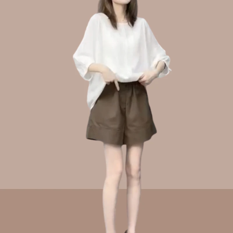 夏装搭配一整套2025新款时尚遮肚子显瘦小衫上衣休闲短裤两件套装