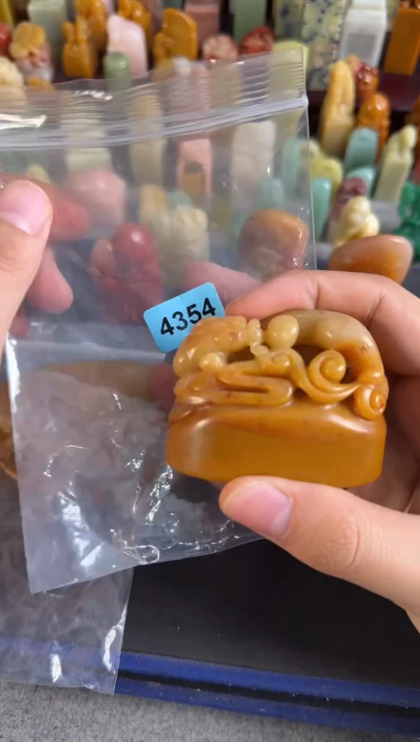 老挝石印石我****的4354包14字