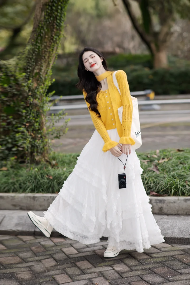 b133春季新款韩系穿搭温柔风黄色针织开衫搭配半身裙气质两件套女