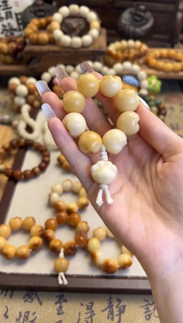 【闪购商品】菩提根/象牙果手串卡17.5猫爪手捻瑕005