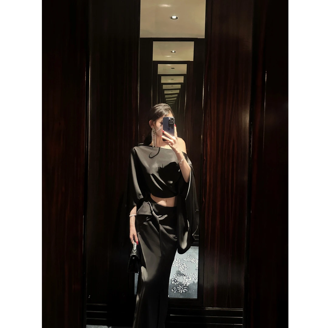 韩系时尚纯欲性感不规则罩衫扭结新款上衣女配显瘦高腰半身裙套装