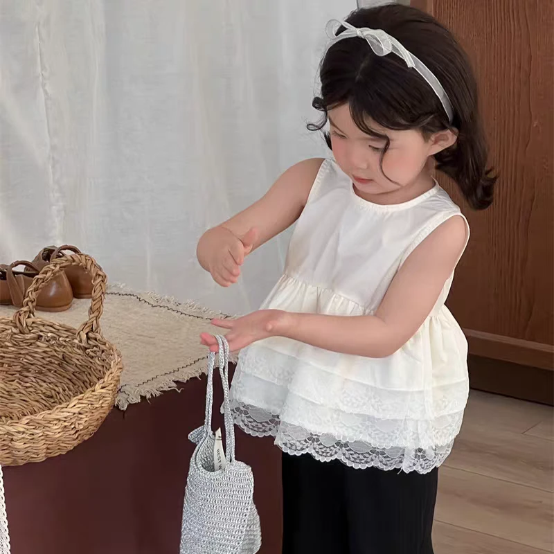 J211春夏L·H·NIAO2025新款女童时髦气质无袖白色蕾丝花边娃娃衫