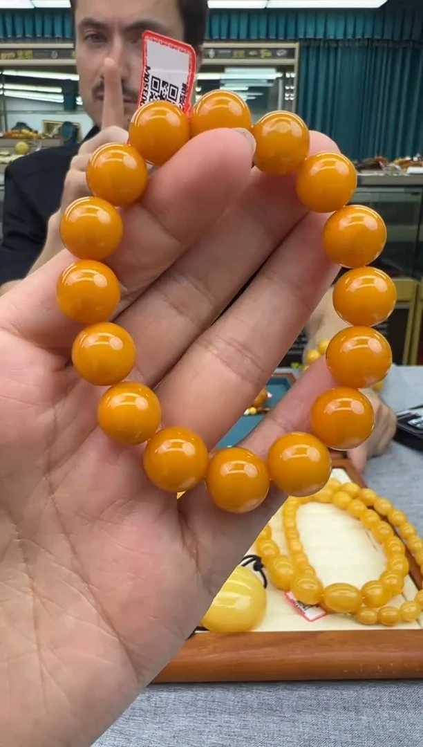 未镶嵌琥珀手链40秒拍号 假一罚三