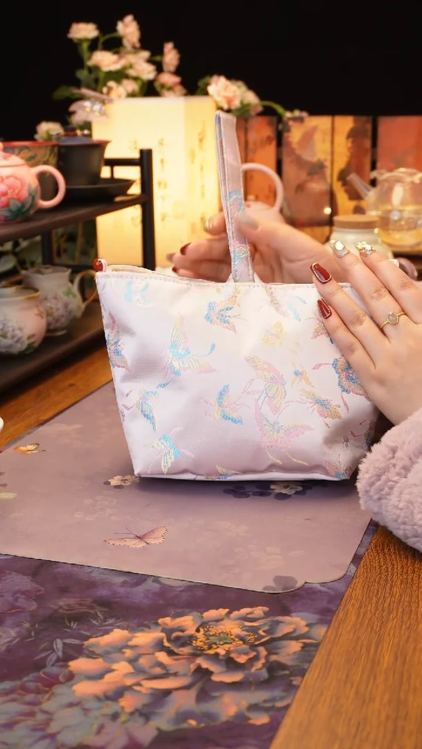 【闪购商品】粉色蝴蝶茶事包·····