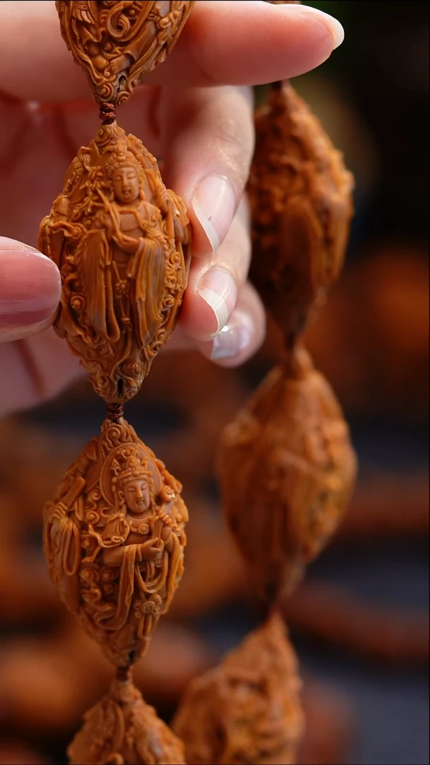 橄榄核手串磊**弟橄榄核