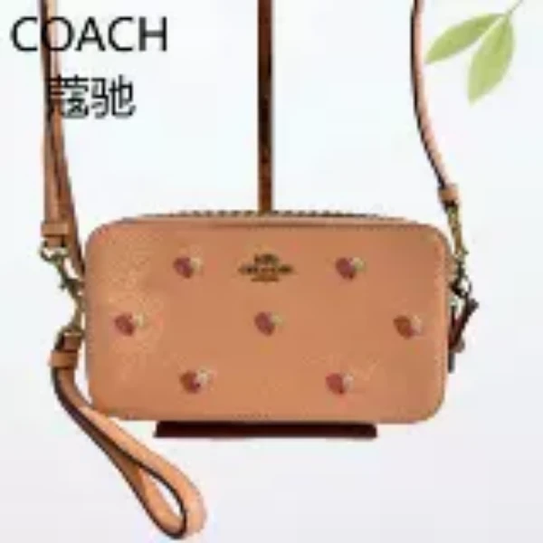99新 COACH/蔻驰 橘粉色相机斜挎包G25703158底长19X10