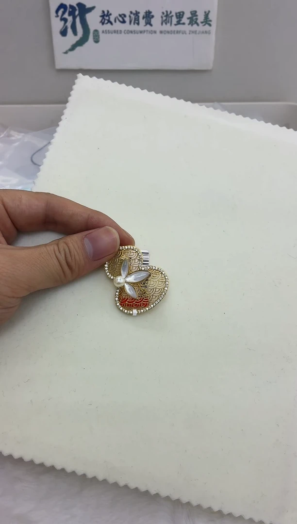 未镶嵌DA海水珍珠羽皇金胸针5-6 BQ129