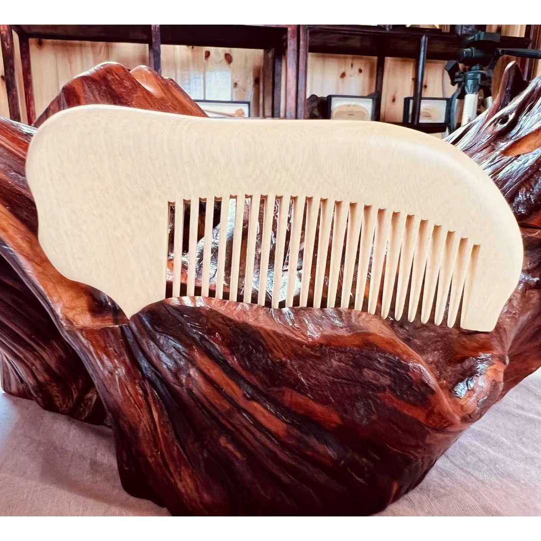 黄杨木大象梳（长12cm、宽5cm、厚1cm )