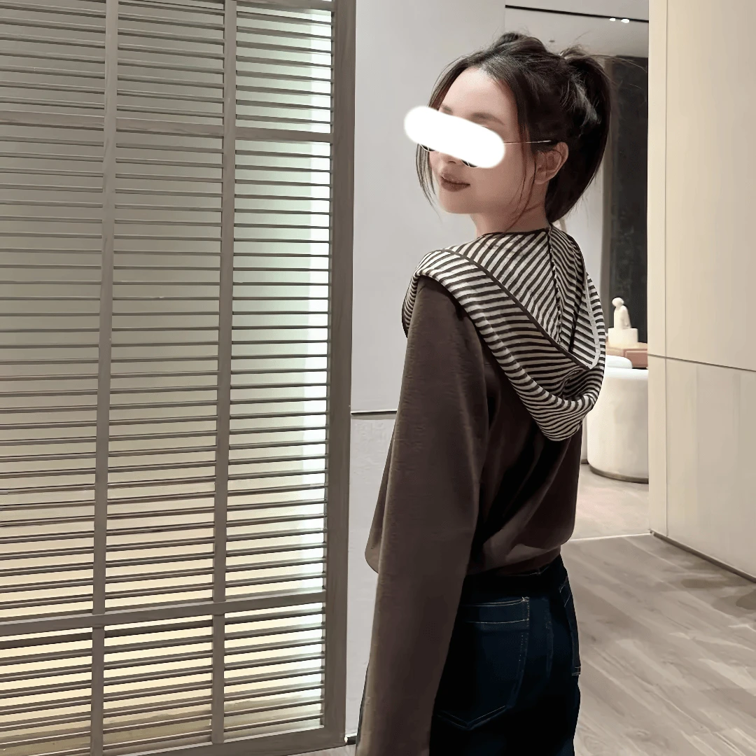 2025年早秋新款韩版百搭通勤休闲拼接斜条纹袖口套头长袖针织衫