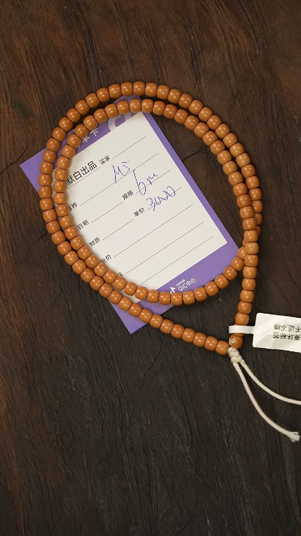 橄榄核吊坠精工细作 终成大器