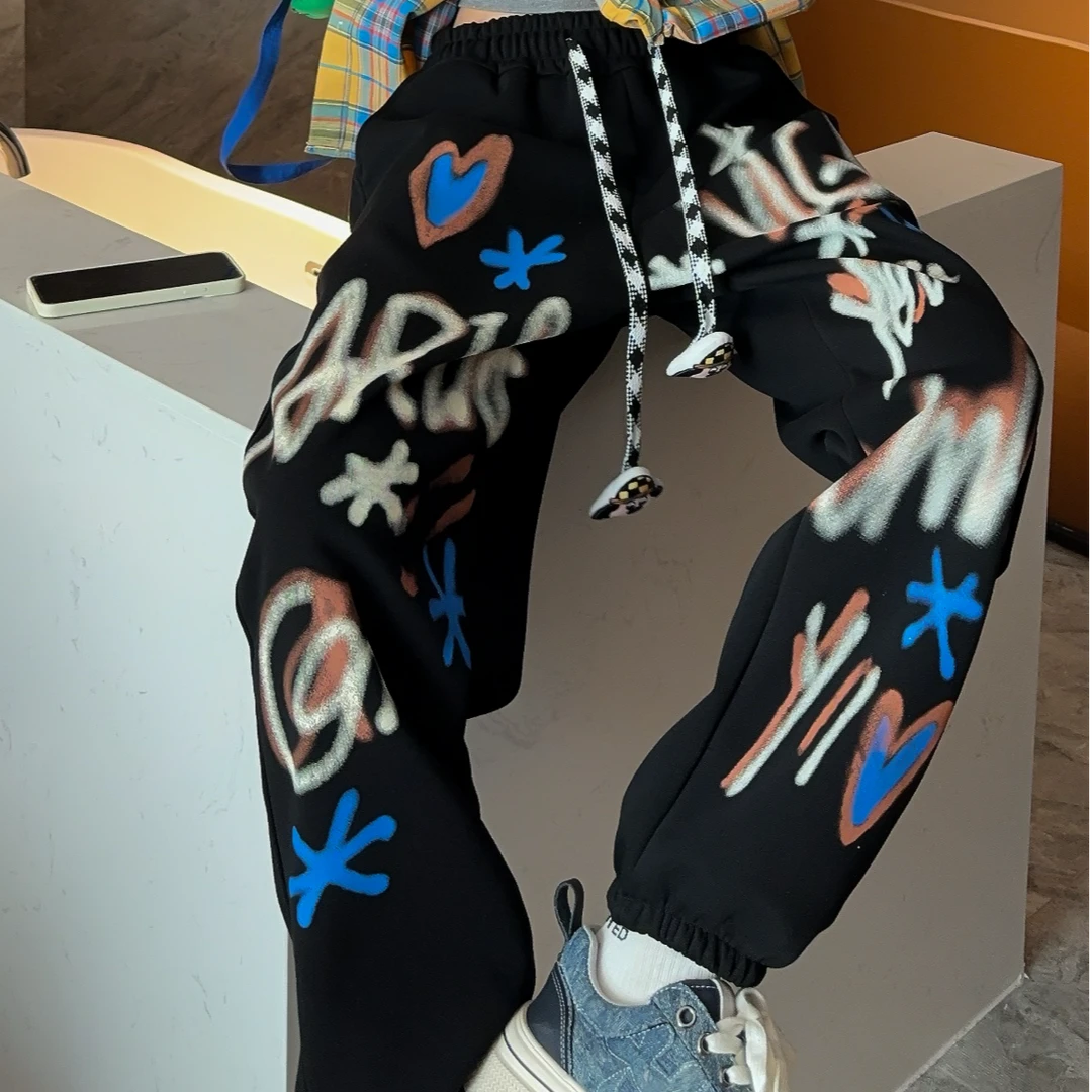 《雪花爱心潮牌卫裤加绒不加绒都有》时尚百搭 秋冬卫裤新年快乐款