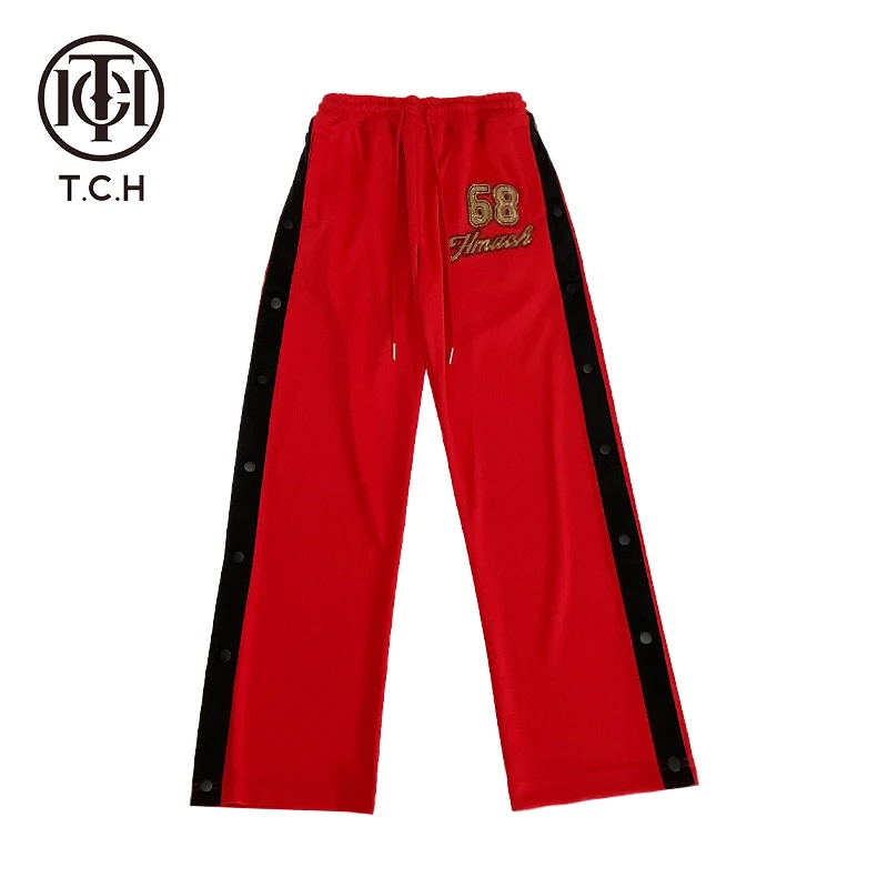 TCH服饰店播-时尚潮牌刺绣烫钻撞色运动风侧开长裤T72A20E6011