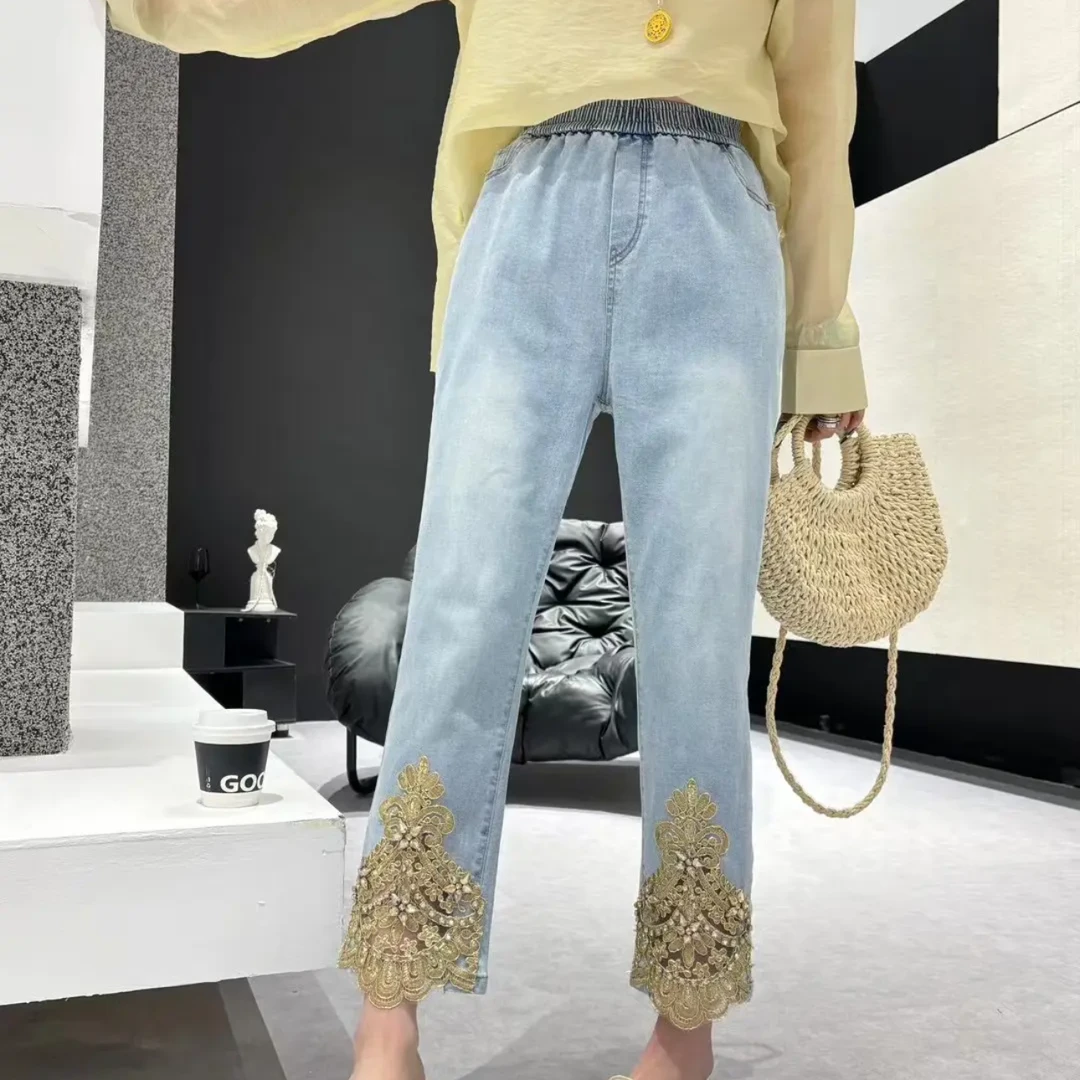 妍2025春季新款蕾丝拼接水洗牛仔裤显瘦设计气质微喇牛仔裤184