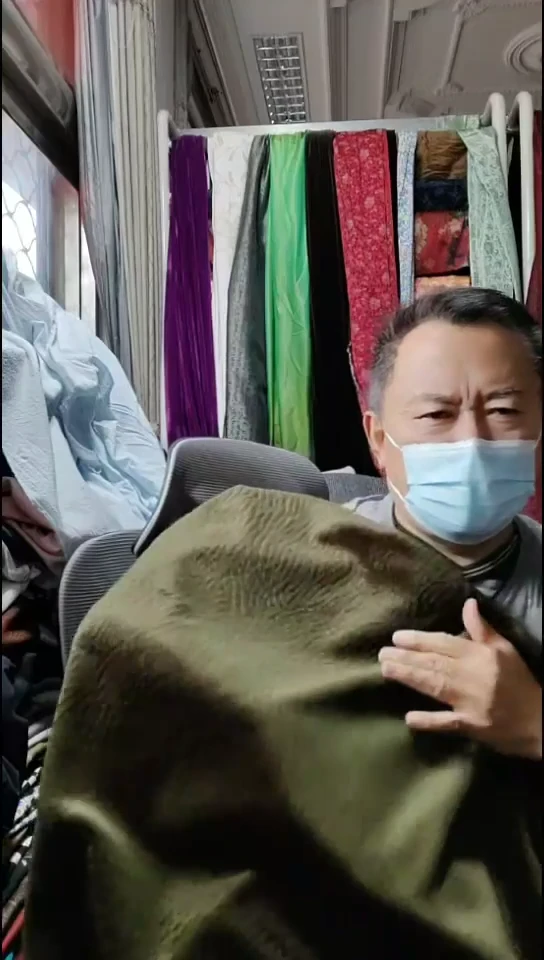 墨茶绿雪花绒绒布料