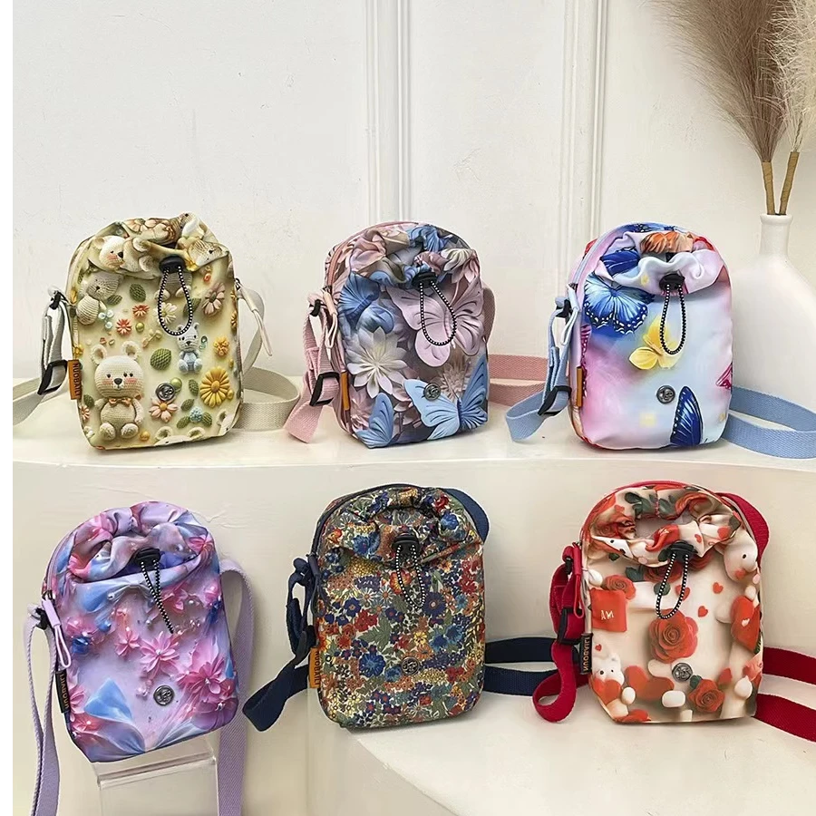 新款韩版舒适防水妈咪包时尚3D印花抽绳水壶包手机包斜挎包包