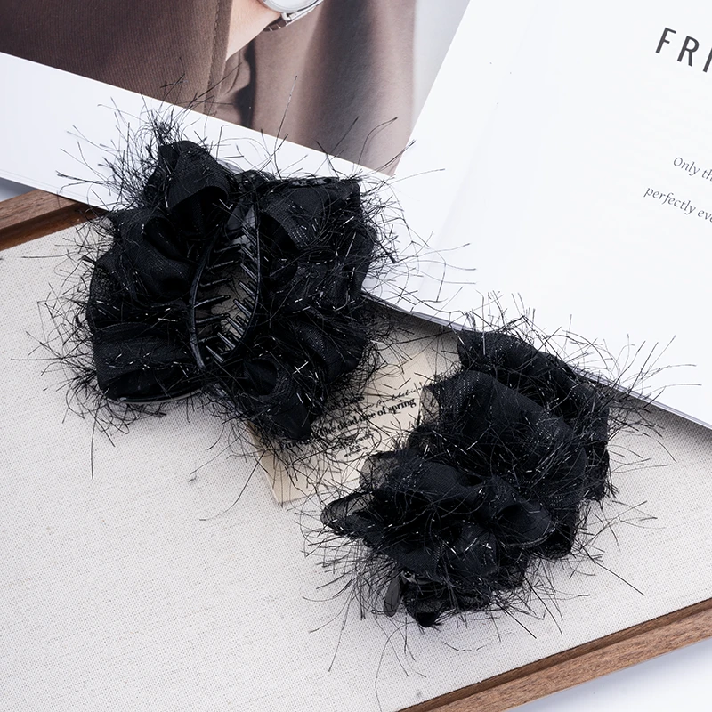 黑色羽毛抓夹女丸子头发夹高马尾固定夹子
