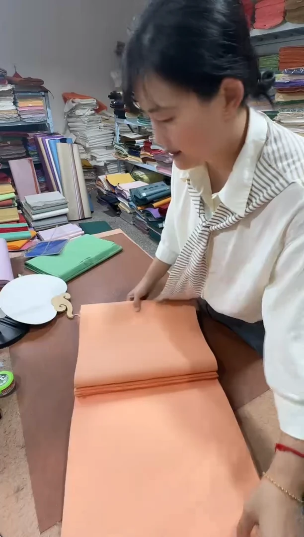 34*138海螺橙真金麻纸50张
