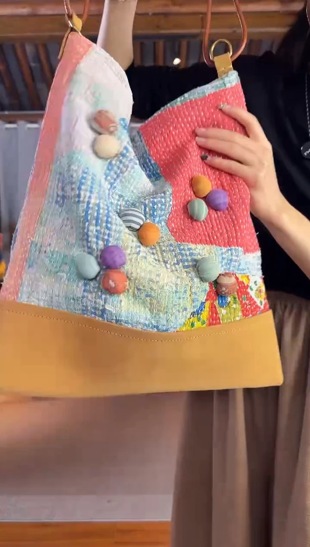 设计师款褴褛牛皮拼接包包