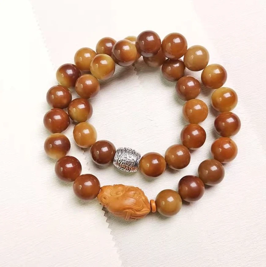 A65-高油脂焦糖心核雕菩提1.2手串