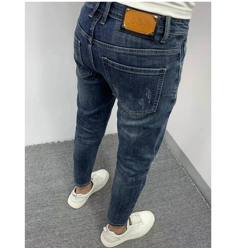 2025夏季蓝色破洞九分牛仔裤男潮流时尚百搭韩版修身小脚水洗弹力